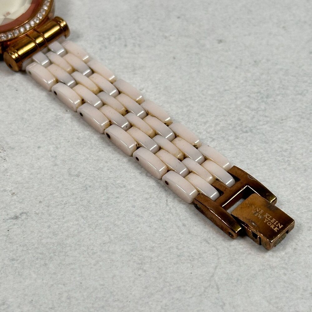 Anne Klein Watch Women 32mm Faceted Crystal MOP Dial Light Pink Band New Battery - Picture 2 of 11